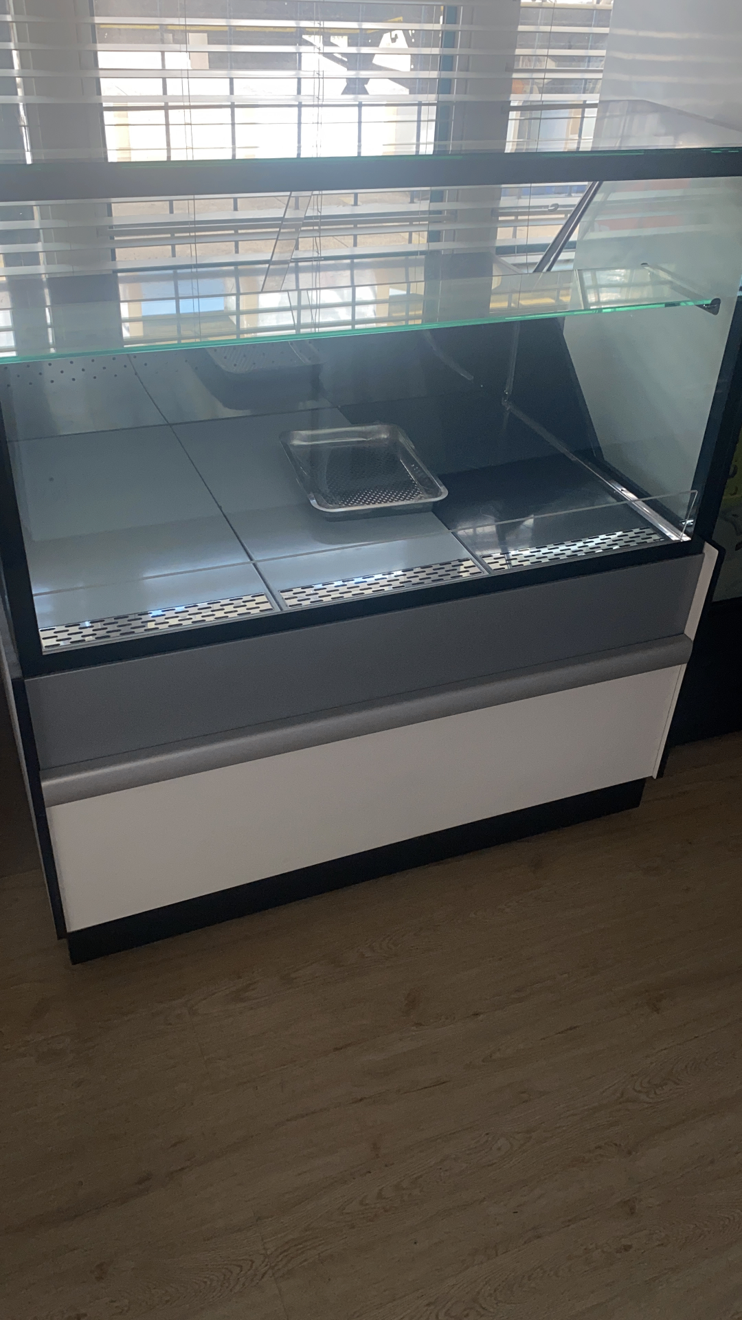 Clean commercial display fridge prepared for retail use